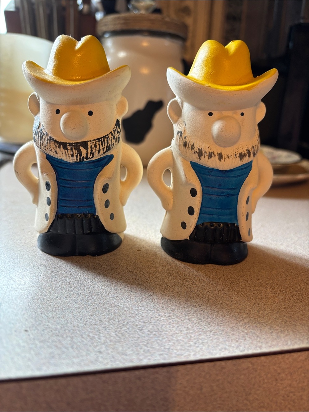 Pair of Ceramic Cowboy Salt & Pepper Shakers - Yellow Hats, Blue Vests